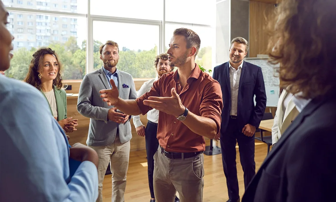 A life coach working with different clients