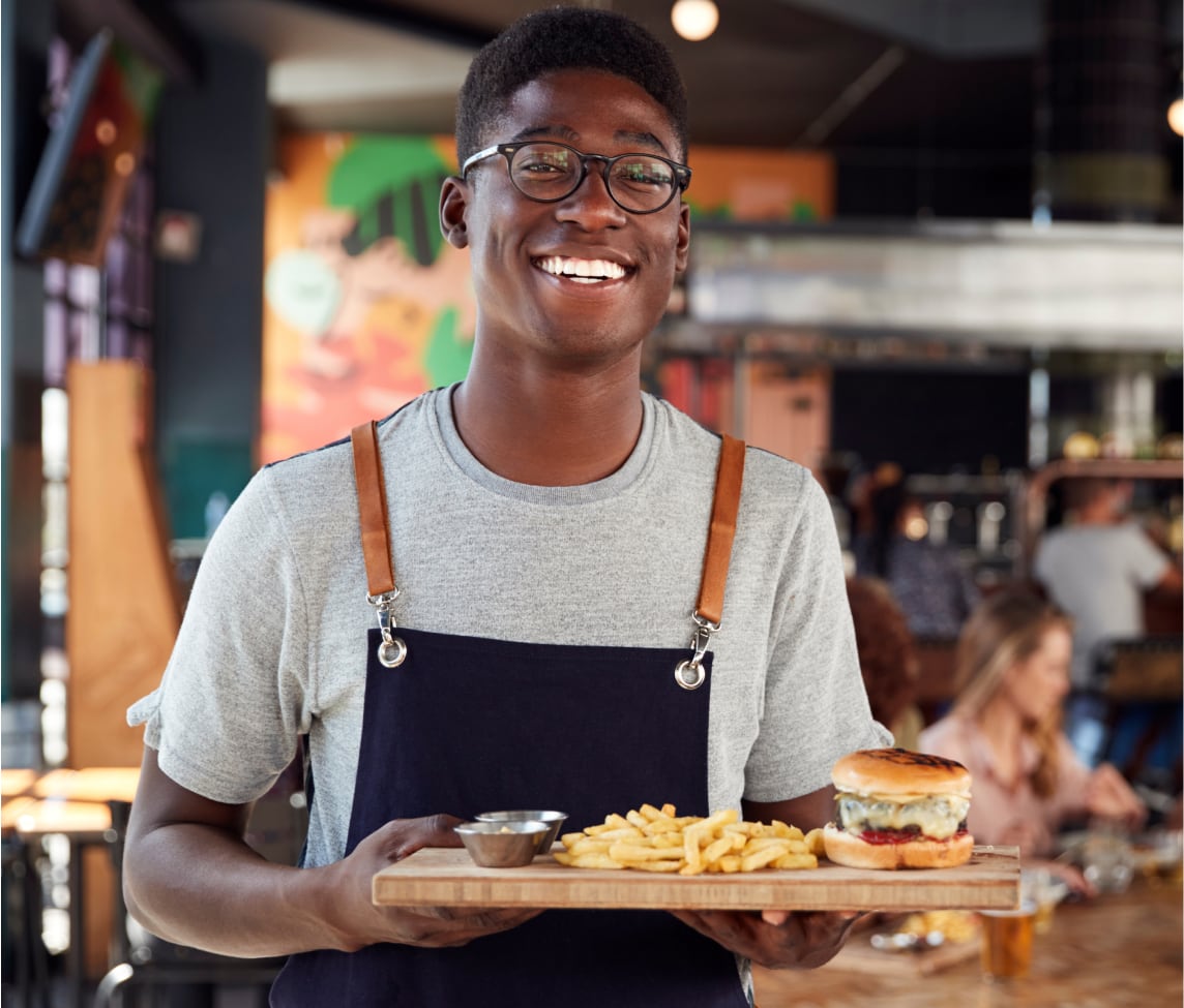 A food business person serving food
