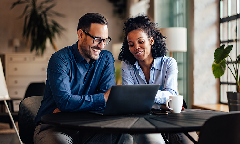 A consultant with a client discussing ideas
