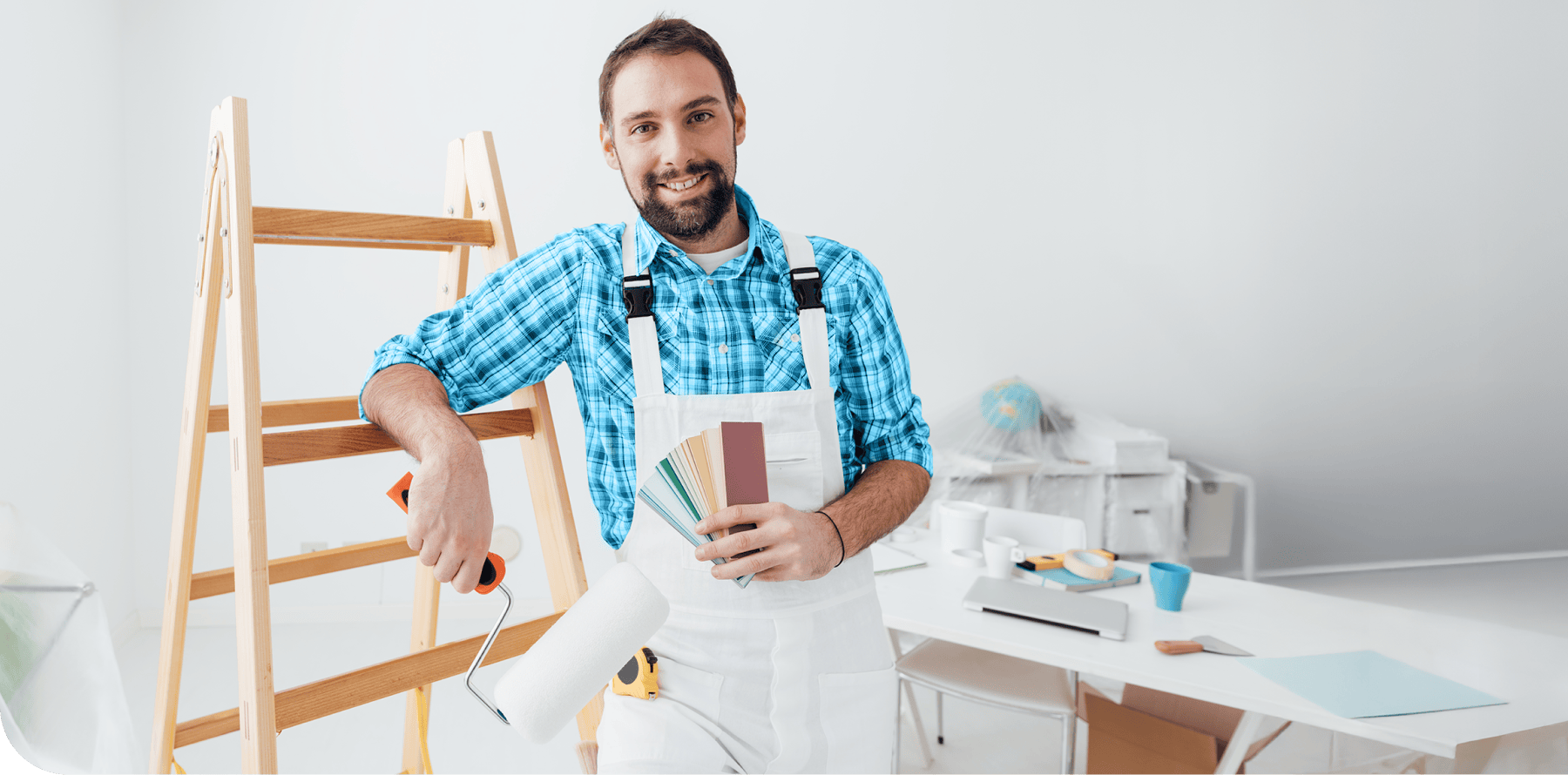 Painter with a paint roller