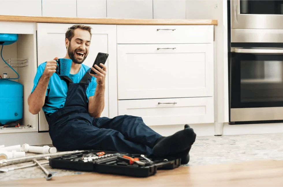 happy plumber at work