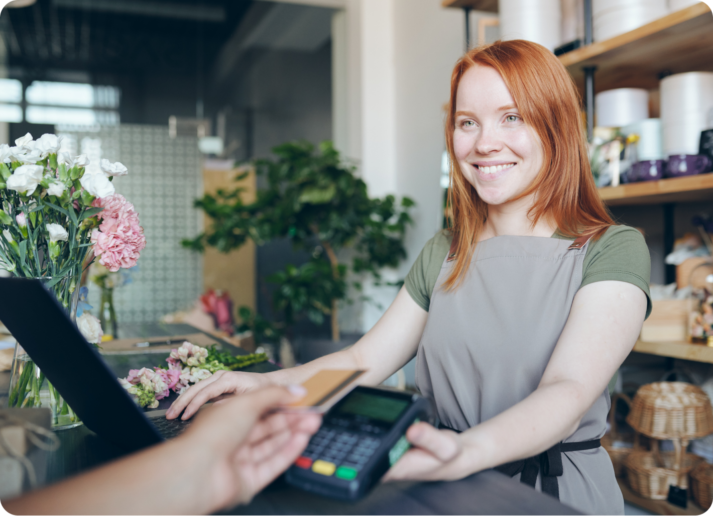 A business owner accepting payment digitally