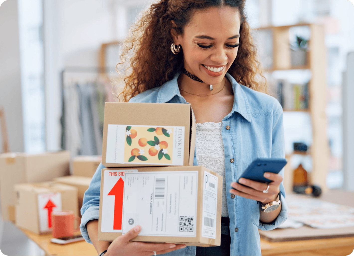 A business owner with a box of goods