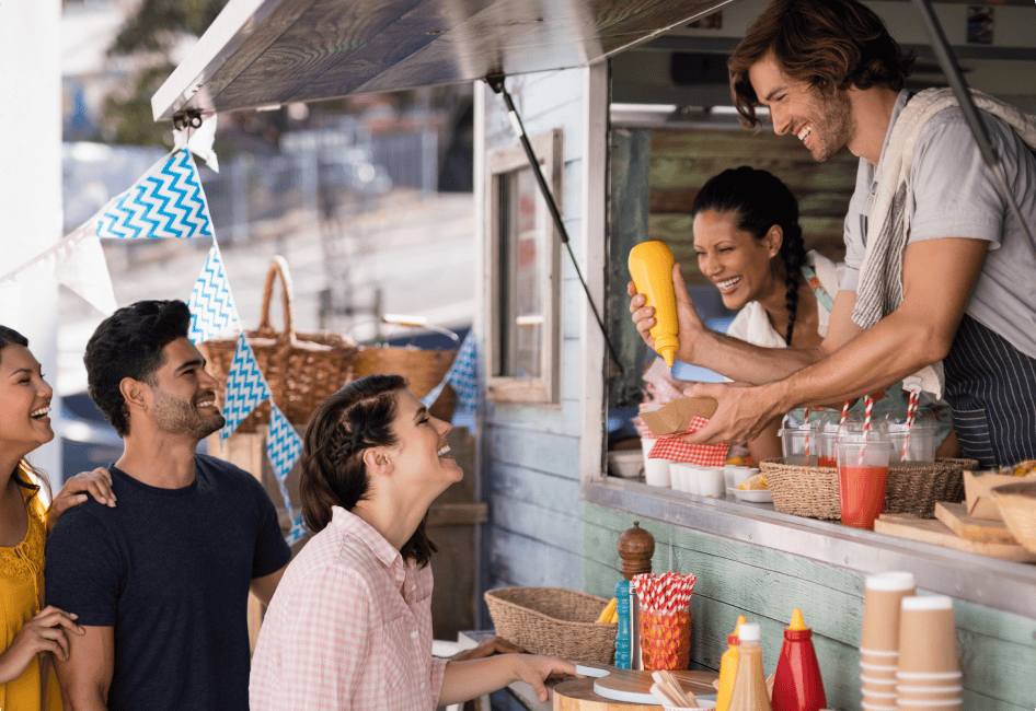 Mobile food truck vendors serving customers